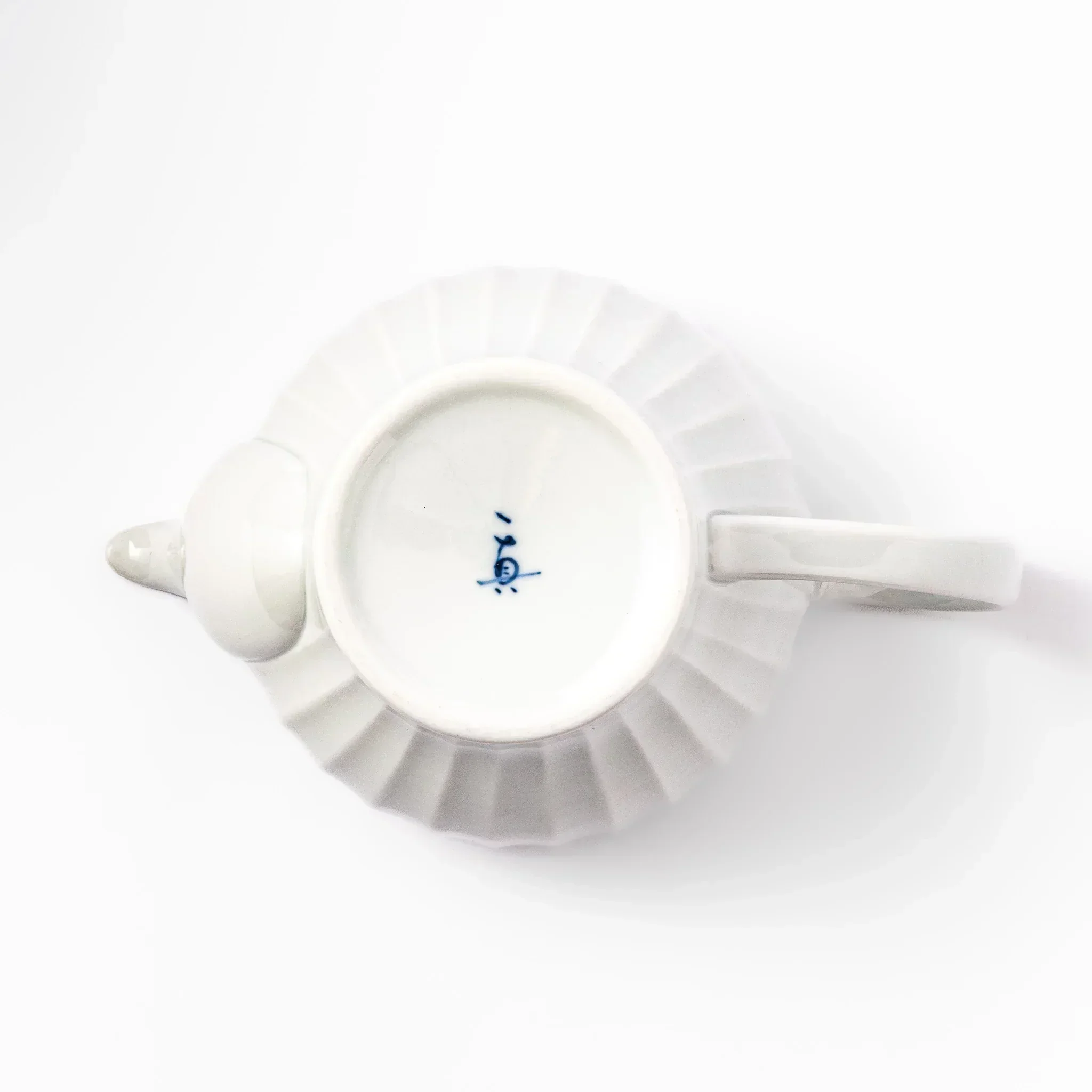 Handcrafted Petal White Teapot - Image 9